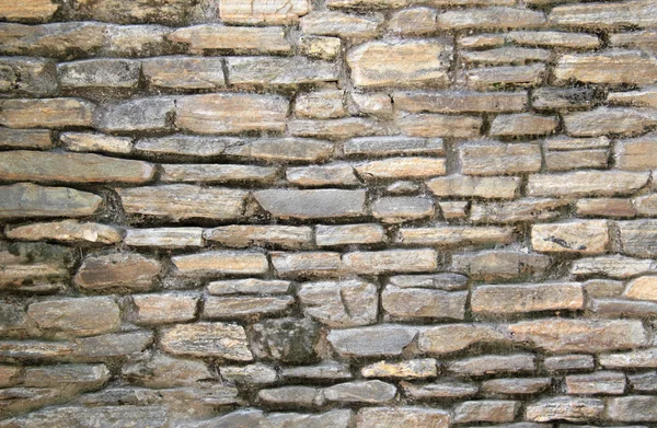 Gestapelde platte stenen blok muur — Stockfoto
