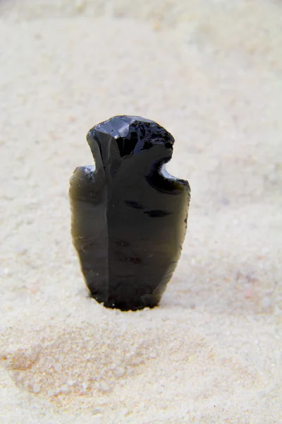 Artifact stuck in sand — Stock Photo, Image