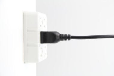 Plugged in power cord clipart