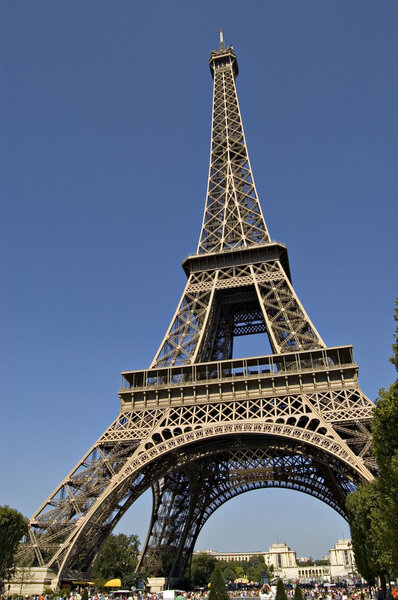 The Eiffel Tower is a puddle iron lattice tower located on the Champ de Mars in Paris.