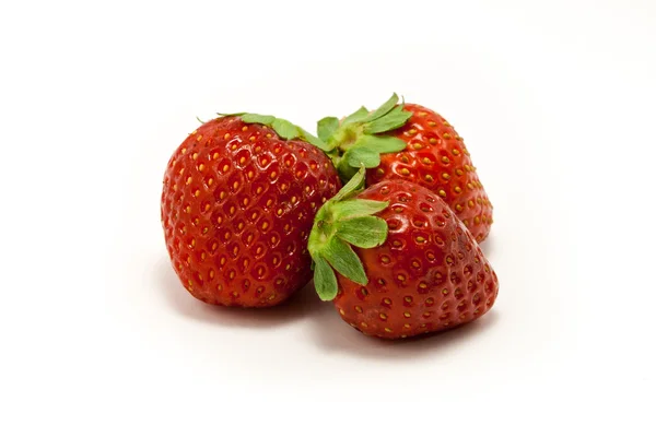 Three juicy strawberries on white background — Stock Photo, Image