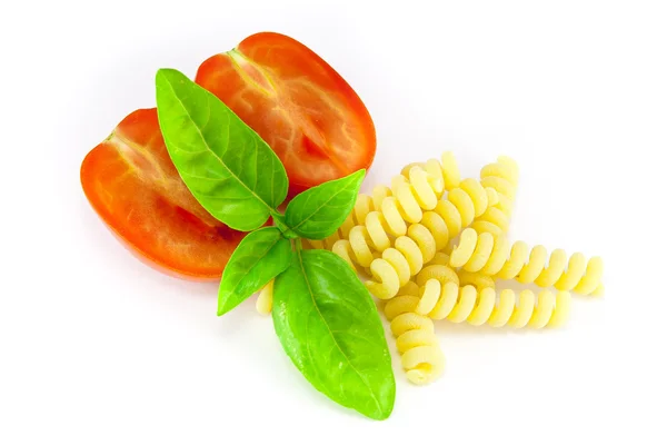 Fusilli pasta with tomatoes and basil — Stock Photo, Image