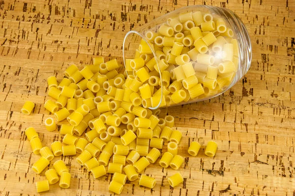 Ditalini pasta inside transparent glass — Stock Photo, Image