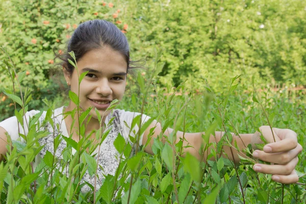 Stock image The girl in the garden.