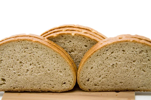 Pão de trigo cozido e cortado — Fotografia de Stock
