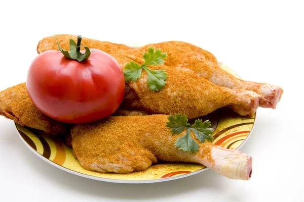 Chickens thigh with tomato — Stock Photo, Image