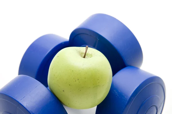 stock image Blue dumbbells with apple