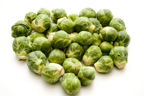 Brussels sprouts in heart form — Stock Photo, Image
