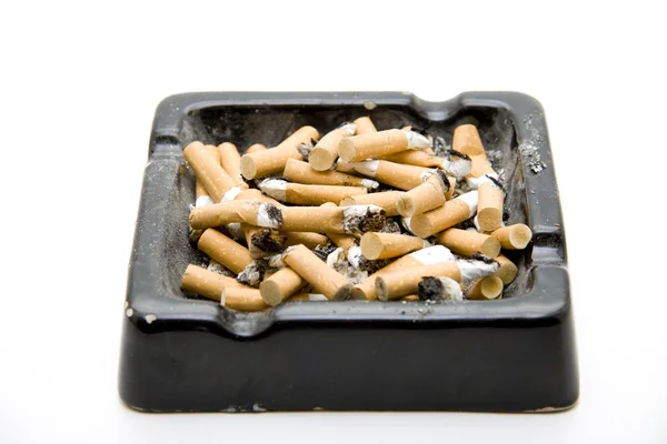 Ashtray completely with cigarets Royalty Free Stock Images