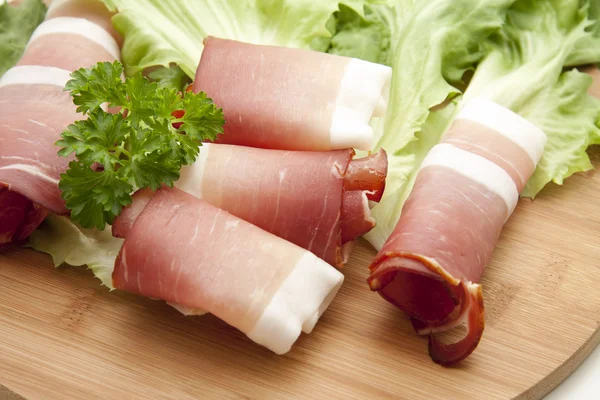 Ham with parsley and salad leaf — Stock Photo, Image