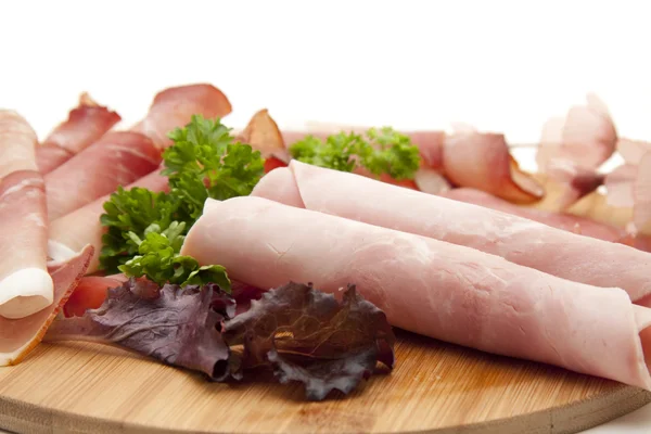 Ham with parsley and salad leaf — Stock Photo, Image