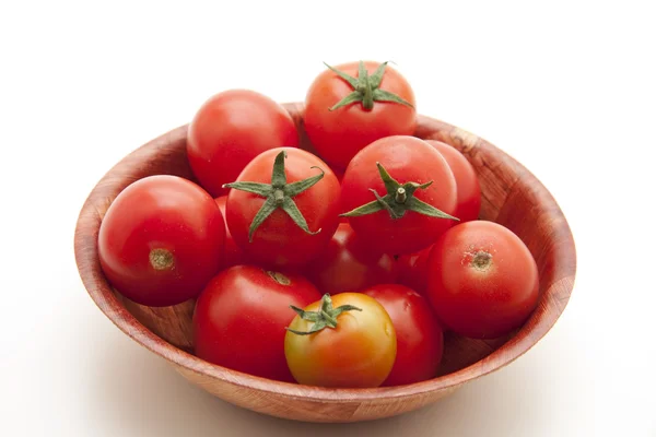 Tomates arbustivos en el bowl —  Fotos de Stock