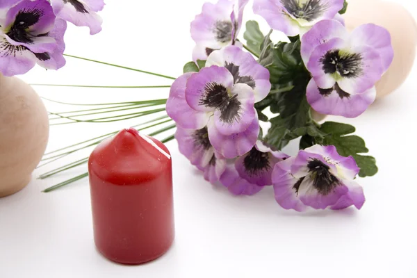 Candle with pansies — Stock Photo, Image