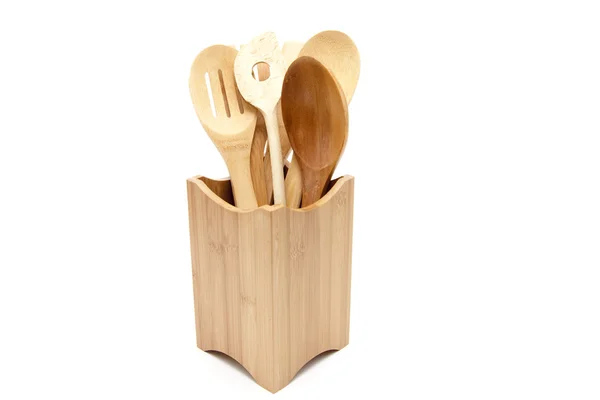 Wooden spoon in the wooden container — Stock Photo, Image