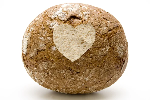 Kalp ile yuvarlak ekmek — Stok fotoğraf