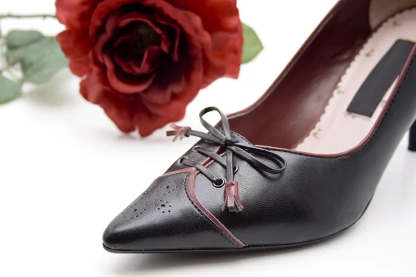 Жіноче взуття з трояндою — стокове фото