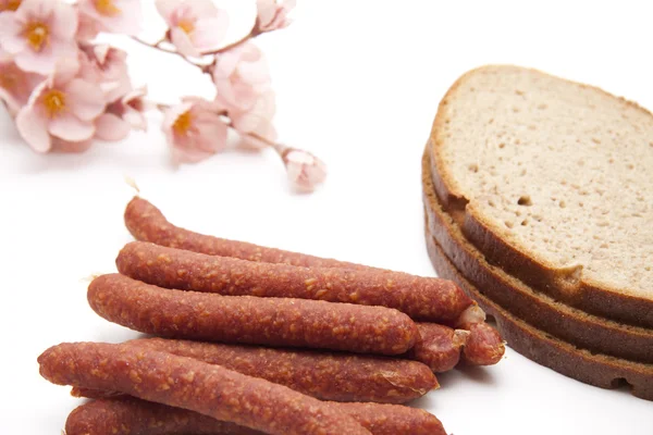 Bologne sausage with flowers — Stock Photo, Image