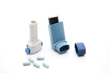 Inhaler with capsules and spray clipart