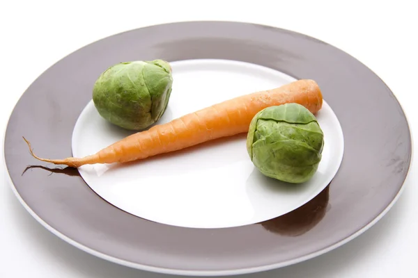 Brussels sprouts and carrot — Stock Photo, Image
