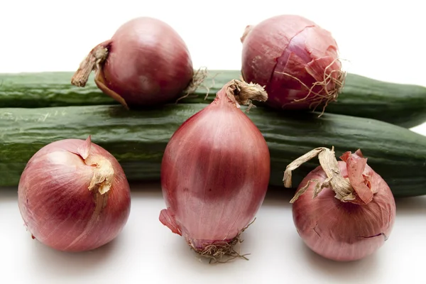 Red onions raw and cucumber — Stock Photo, Image