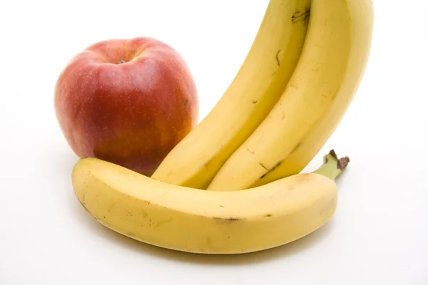 Bananen und Apfel — Stockfoto