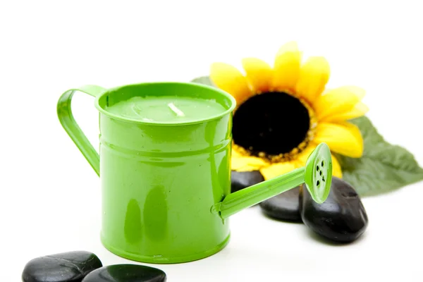 Watering can with sunflowers — Stock Photo, Image