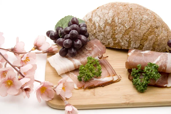 Raw ham with bread — Stock Photo, Image