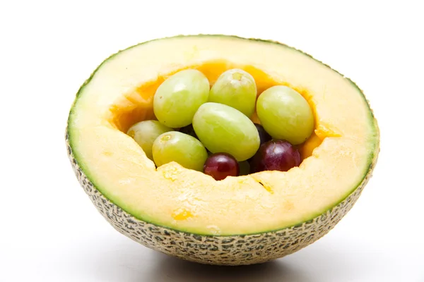 stock image Melon with grapes