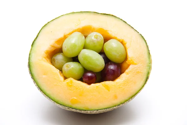 stock image Melon with grapes