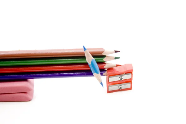 Coloured pencils and sharpeners — Stock Photo, Image