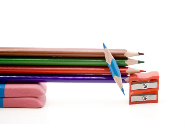 Coloured pencils and sharpeners — Stock Photo, Image