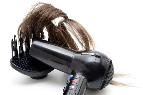 Włosy suszarką do włosów — Zdjęcie stockowe