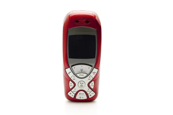 Červený mobilní telefon — Stock fotografie