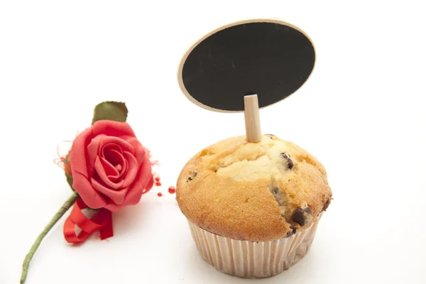 Muffin with rose — Stock Photo, Image