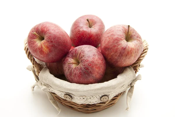 Fresh red apples in basket — Stock Photo, Image
