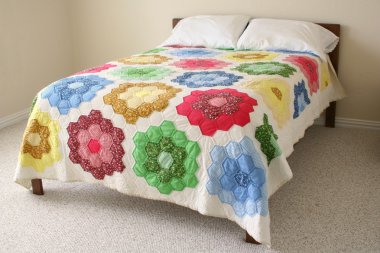 Bed with quilt clipart