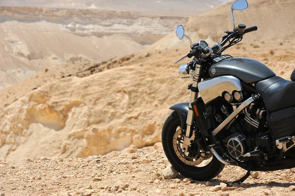 Motorcycle in a desert — Stock Photo, Image