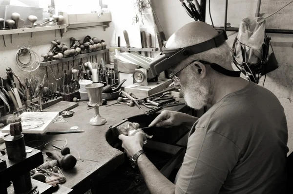 stock image A very old jewelery shop and a jeweler in work