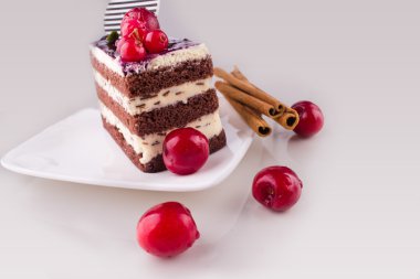 Delicious fresh baked cream cherry cake clipart