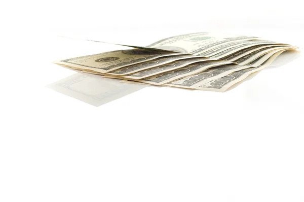 Bir sürü para üzerinde beyaz izole — Stok fotoğraf