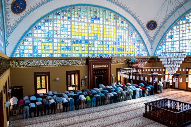 Muslims who worship in prayer istanbul Turkey clipart