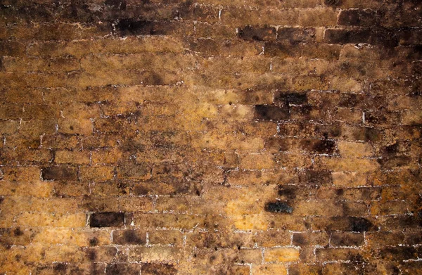 Кирпичная стена в качестве фона — стоковое фото