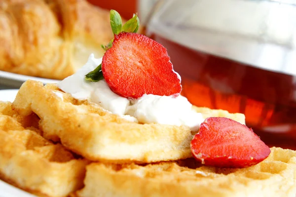 Tasty breakfast - tea, croissants, wafers — Stock Photo, Image