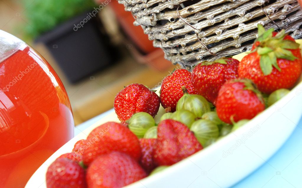 Strawberries, gooseberry, basket and compote