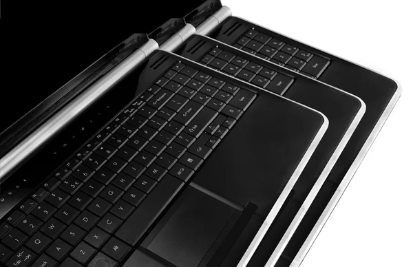 Três pilha laptop — Fotografia de Stock