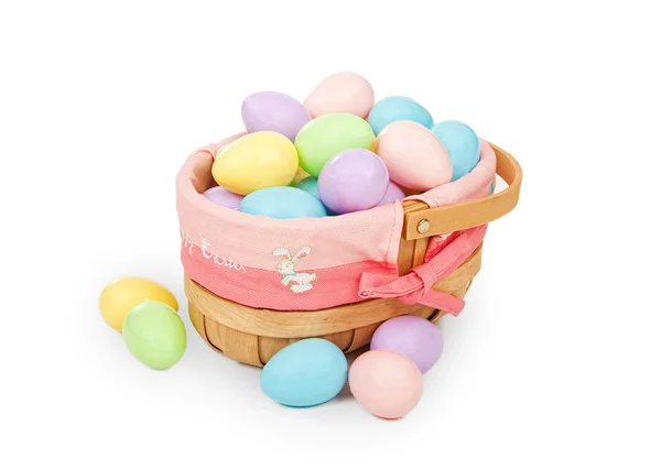 Easter basket with pastel colored plastic eggs — Stock Photo, Image
