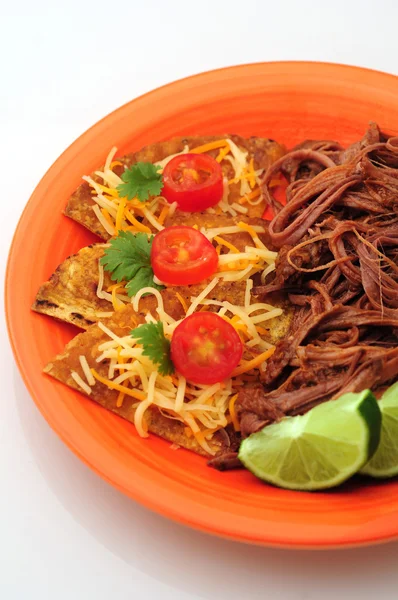 Nachos and shredded beef on a white background — Stock Photo, Image