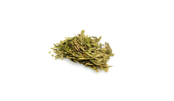 Green tea leaves on white — Stock Photo, Image