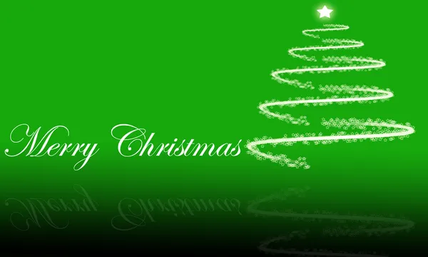 Merry christmas tekst en kerstboom op groene achtergrond — Stockfoto