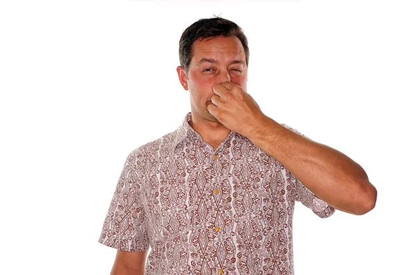 Smelling something with bad odor — Stock Photo, Image